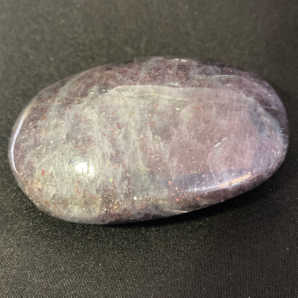 Iolite Palm Stone. 3” tall x 2” wide. Sparkles on both sides. Purple in Color.